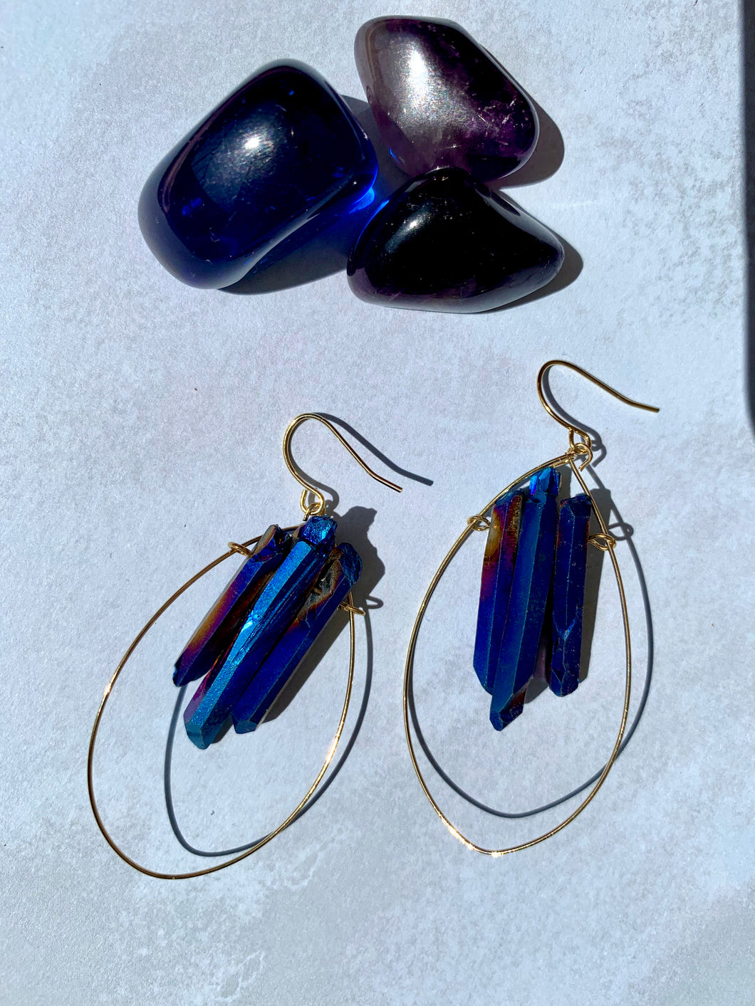 Peacock Ore oval earrings